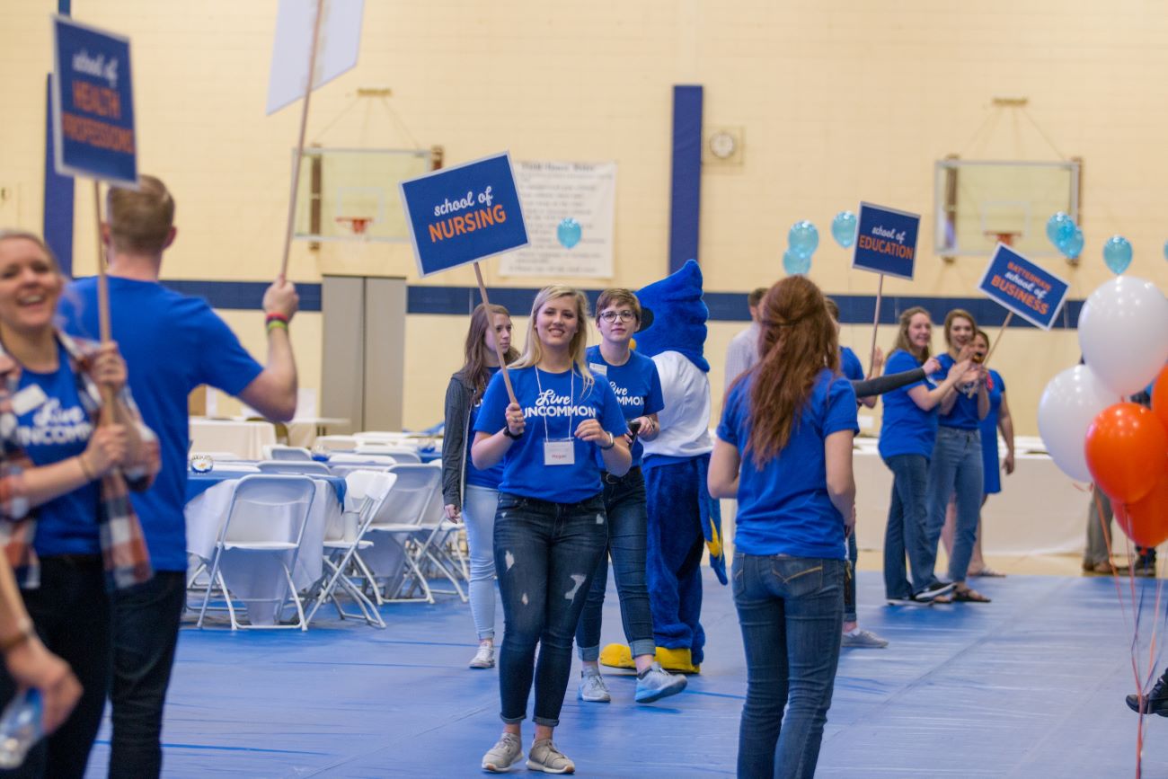 students with signs