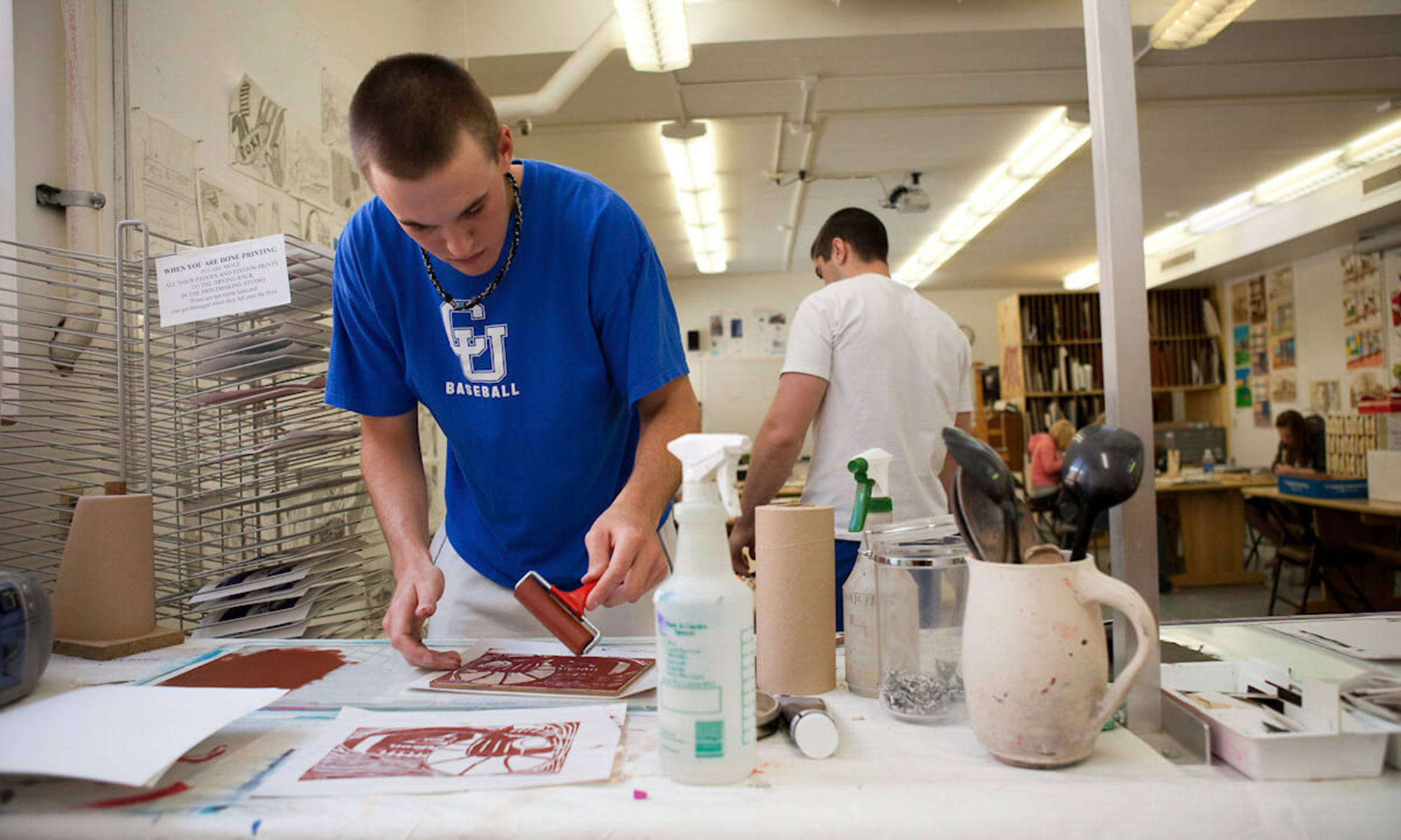 A CUW student creates artwork at Concordia.