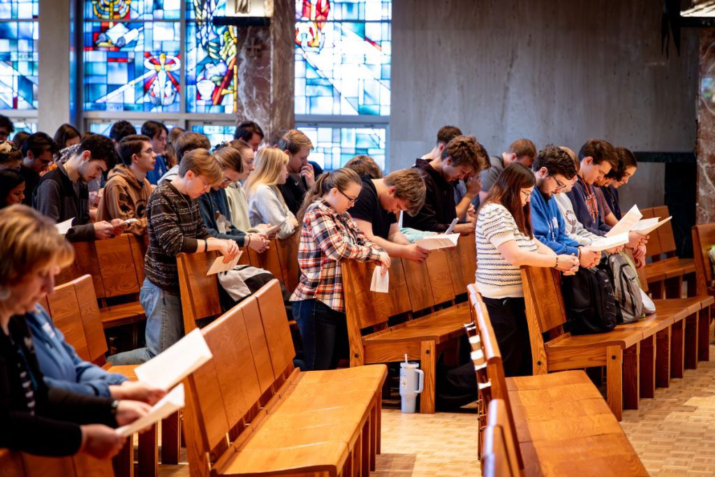 sideview of students in chapel