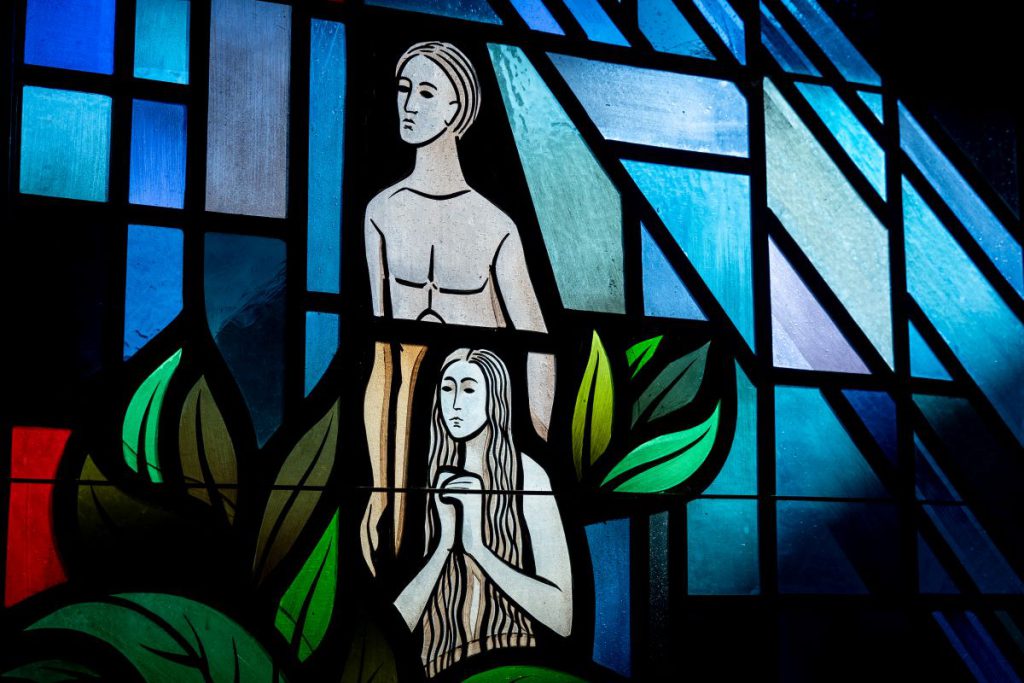 stained glass of Adam and Eve