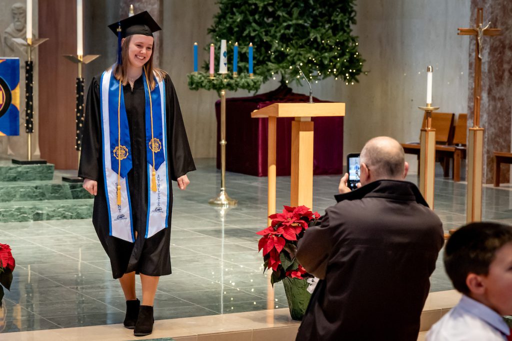 woman getting picture taken in chapel