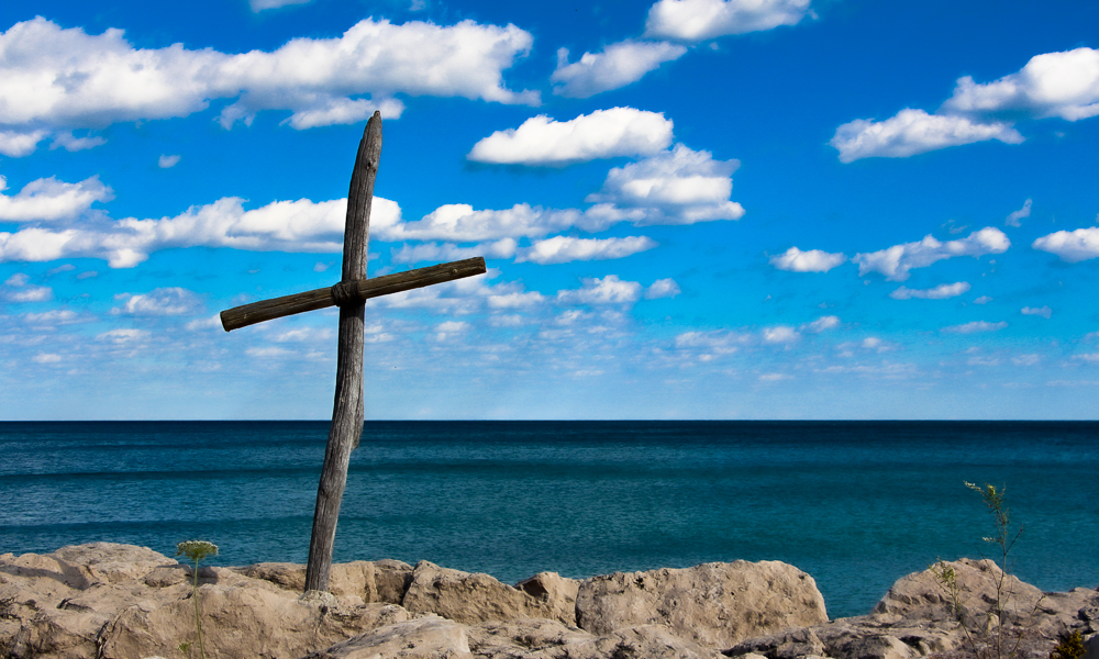 Cross on the bluff against a blue sky