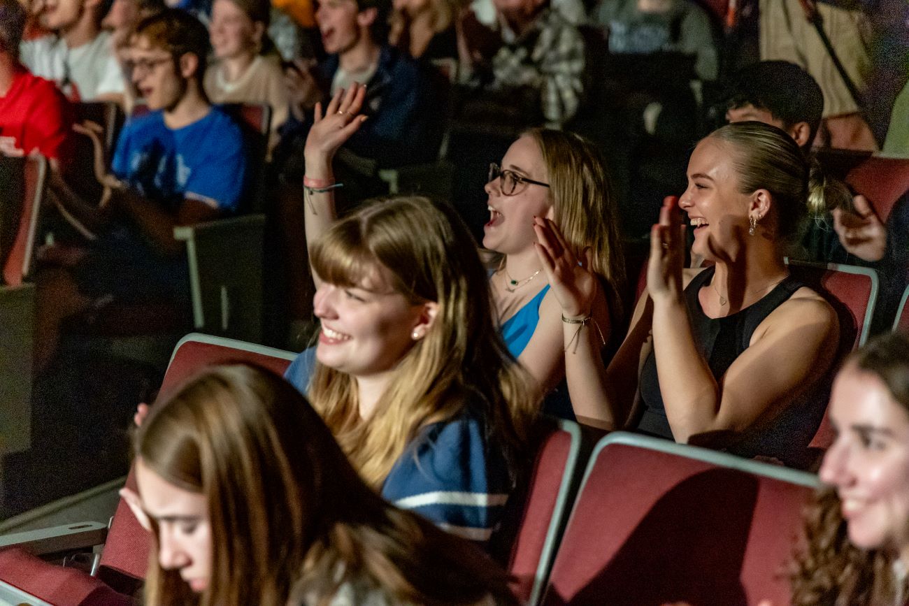 people in there seats cheering