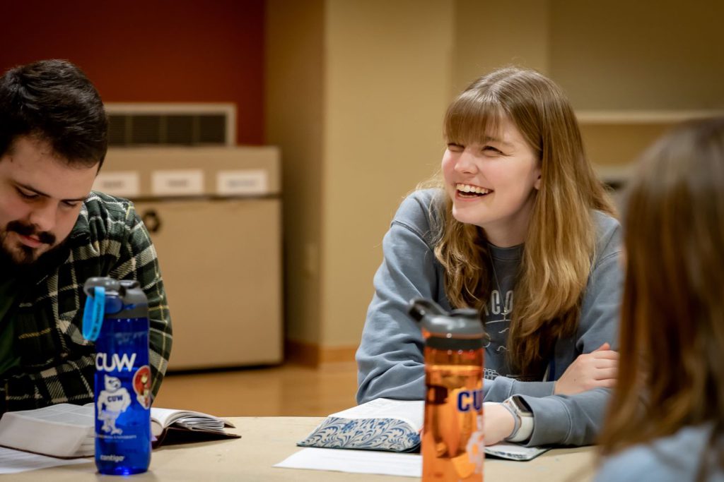 A girl smiling at bible study