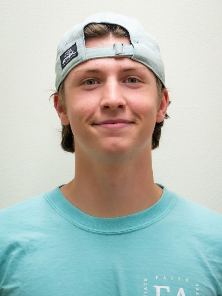 boy with backwards hat on