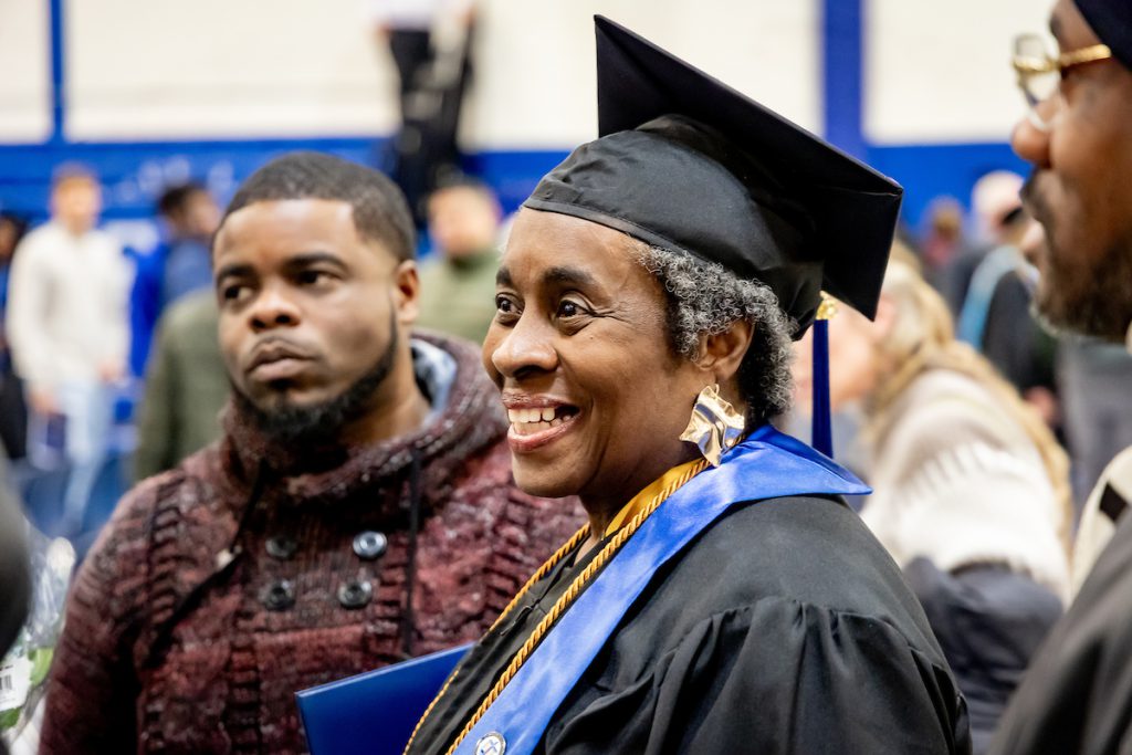 close up of older woman with cap