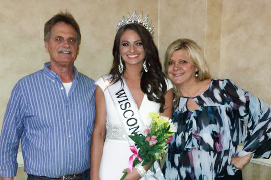 Danika Tramburg, the newly announced Miss Wisconsin United States, poses with her parents at the pageant’s conclusion.
