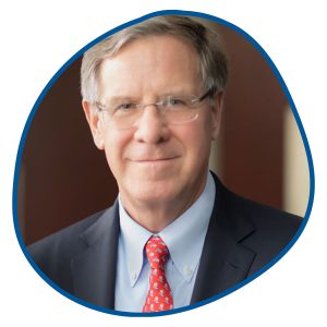 man with red tie and suit
