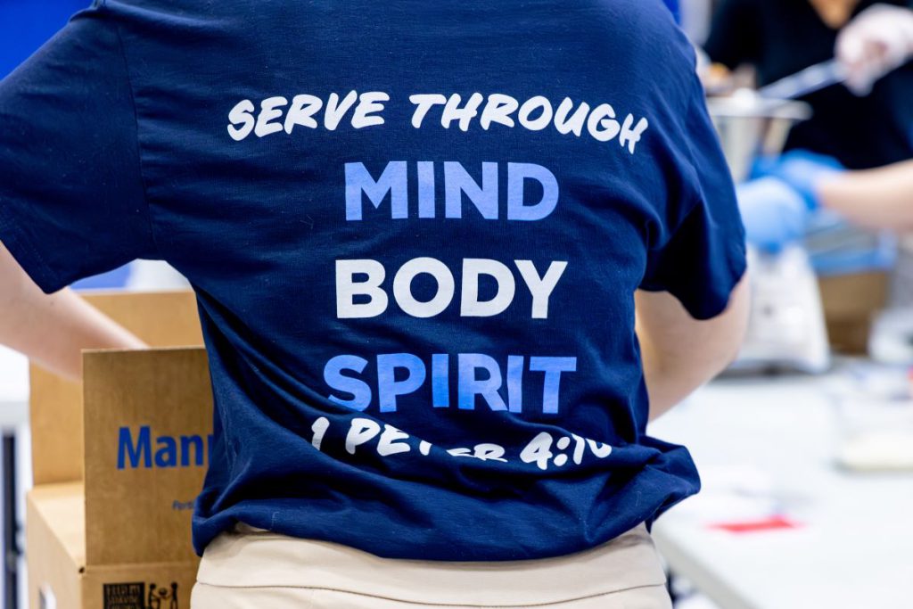 mind, body and spirit logo on back of shirt