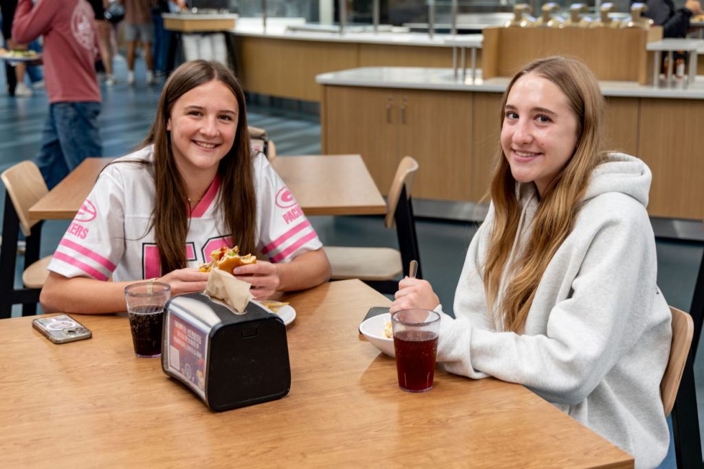 Two girls enjoying lunch