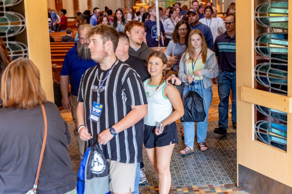 people exiting the chapel