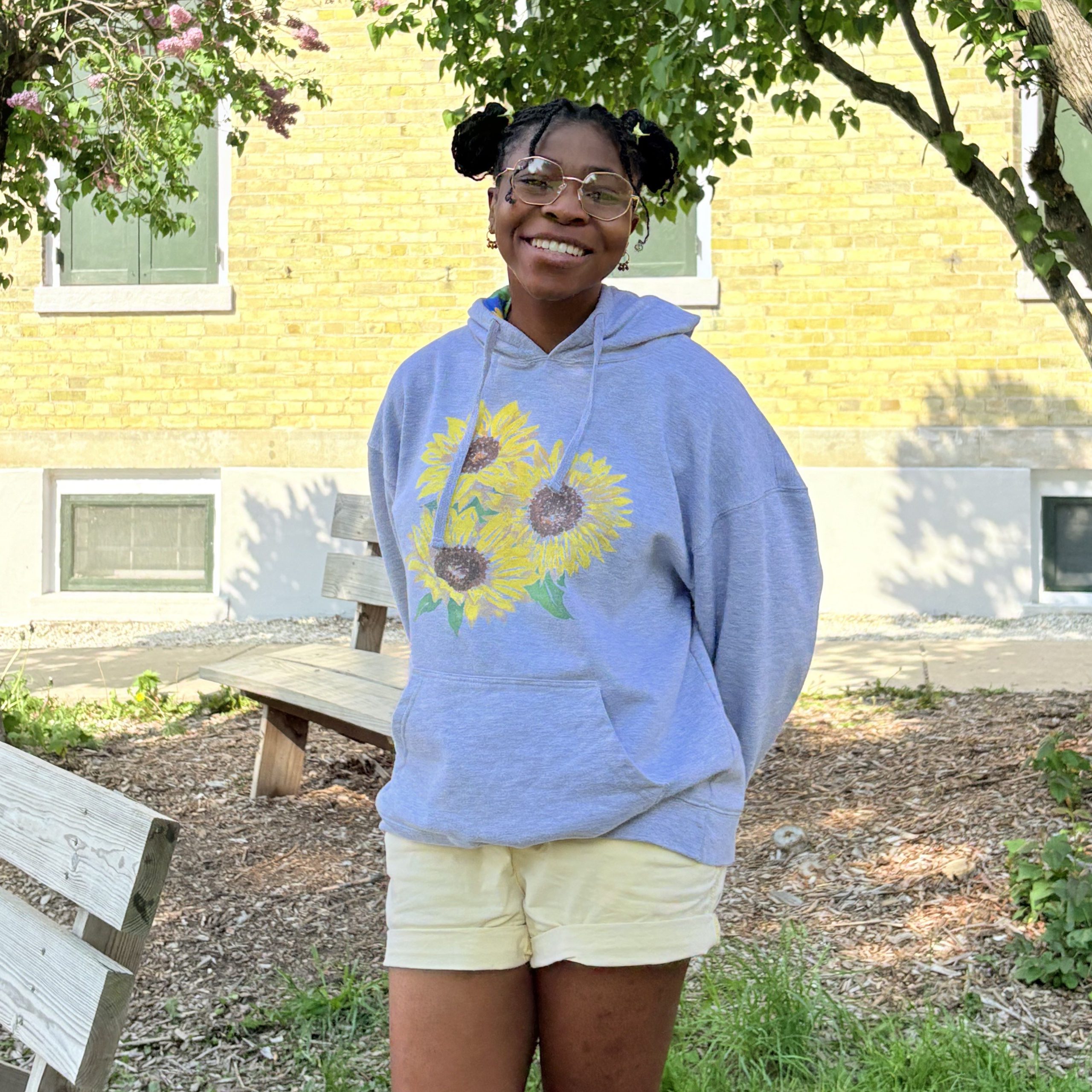 black girl with blue sweatshirt