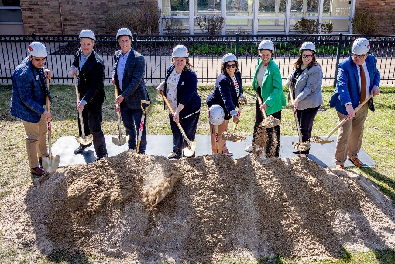 various men and women at groundbreaking ceremony
