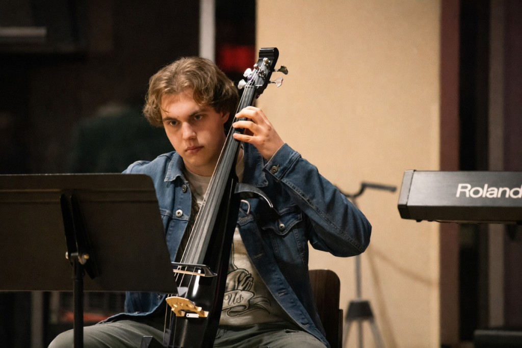 student playing guitar
