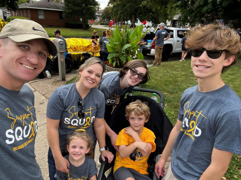 family photo with four kids