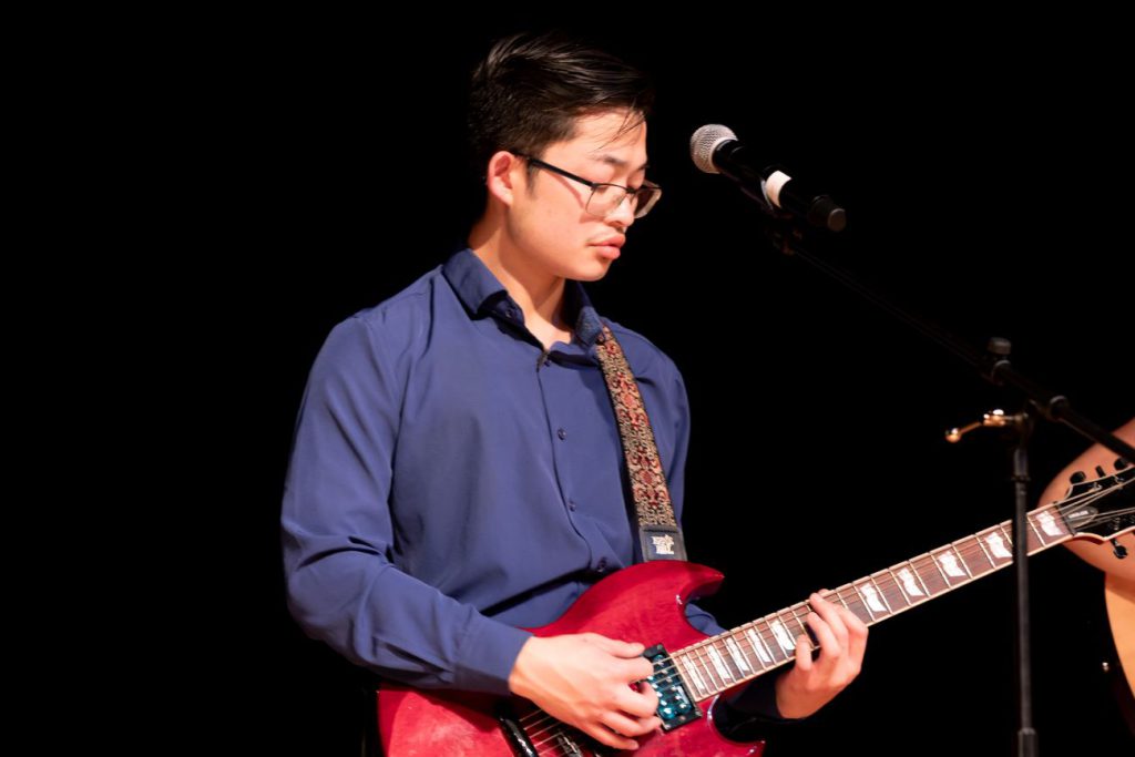 guy playing guitar