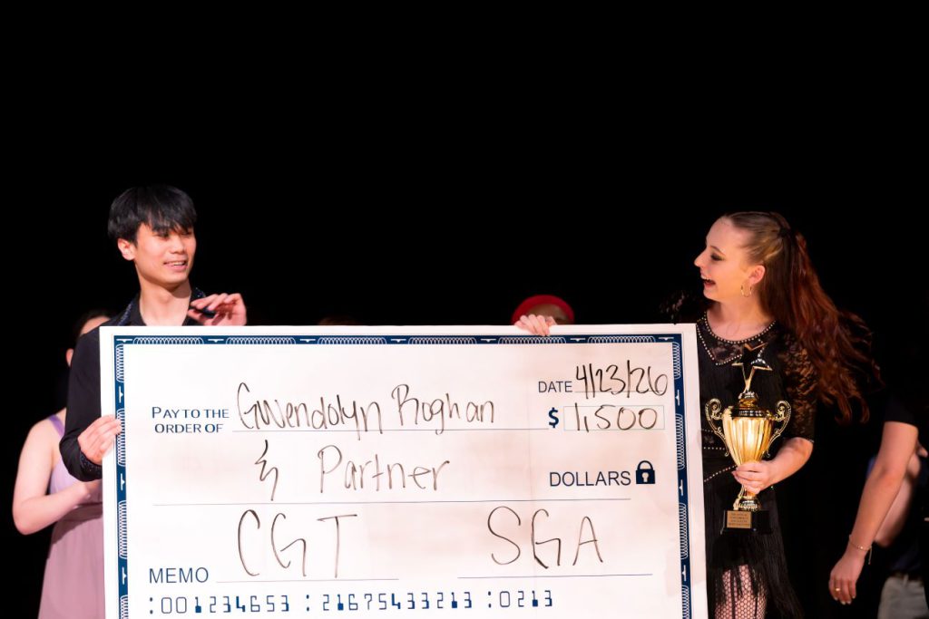winners holding check