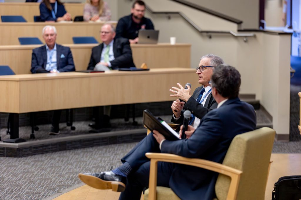 men having a talk in conference room