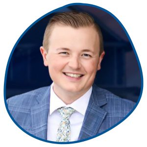 man smiling with tie and suit