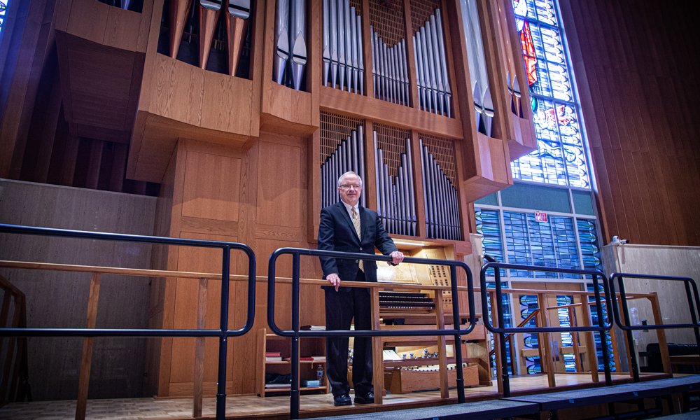 Dr. Jim Freese with the Chapel organ