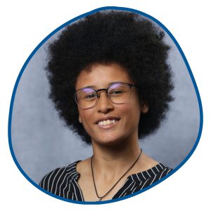 girl with black afro hair and glasses