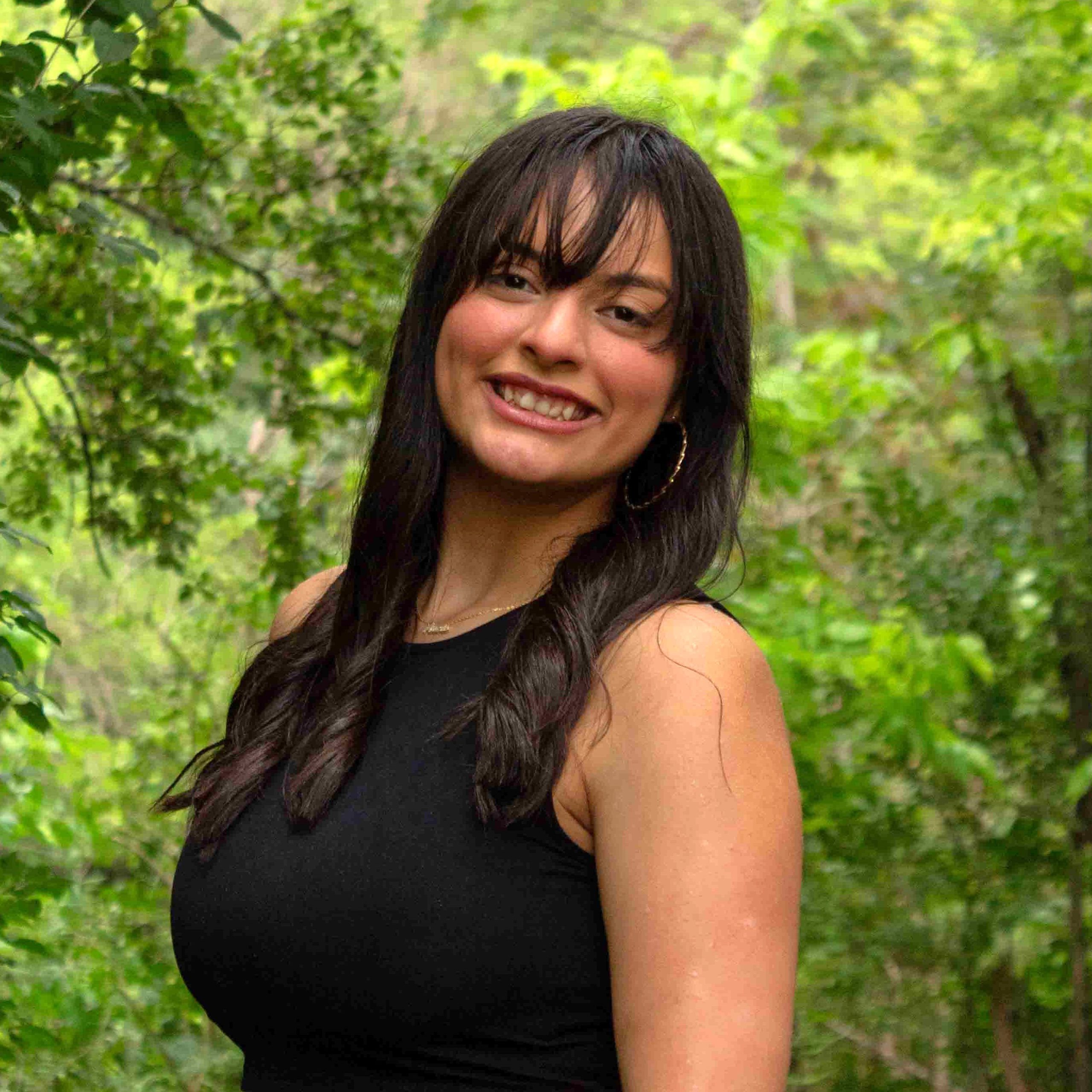 girl with brown hair with black shirt