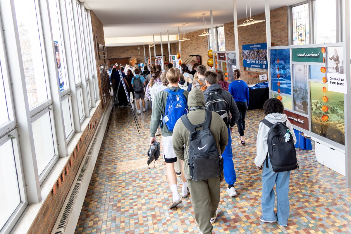 students walking down hallway