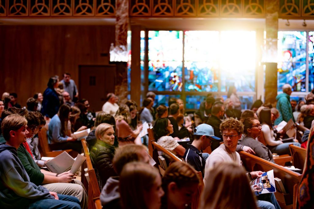 crowd of people in chapel