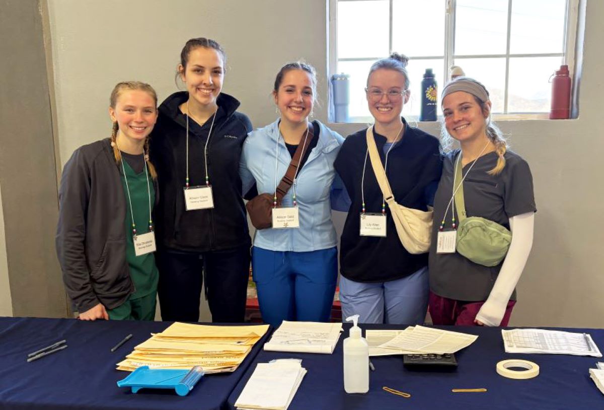 five students at a table