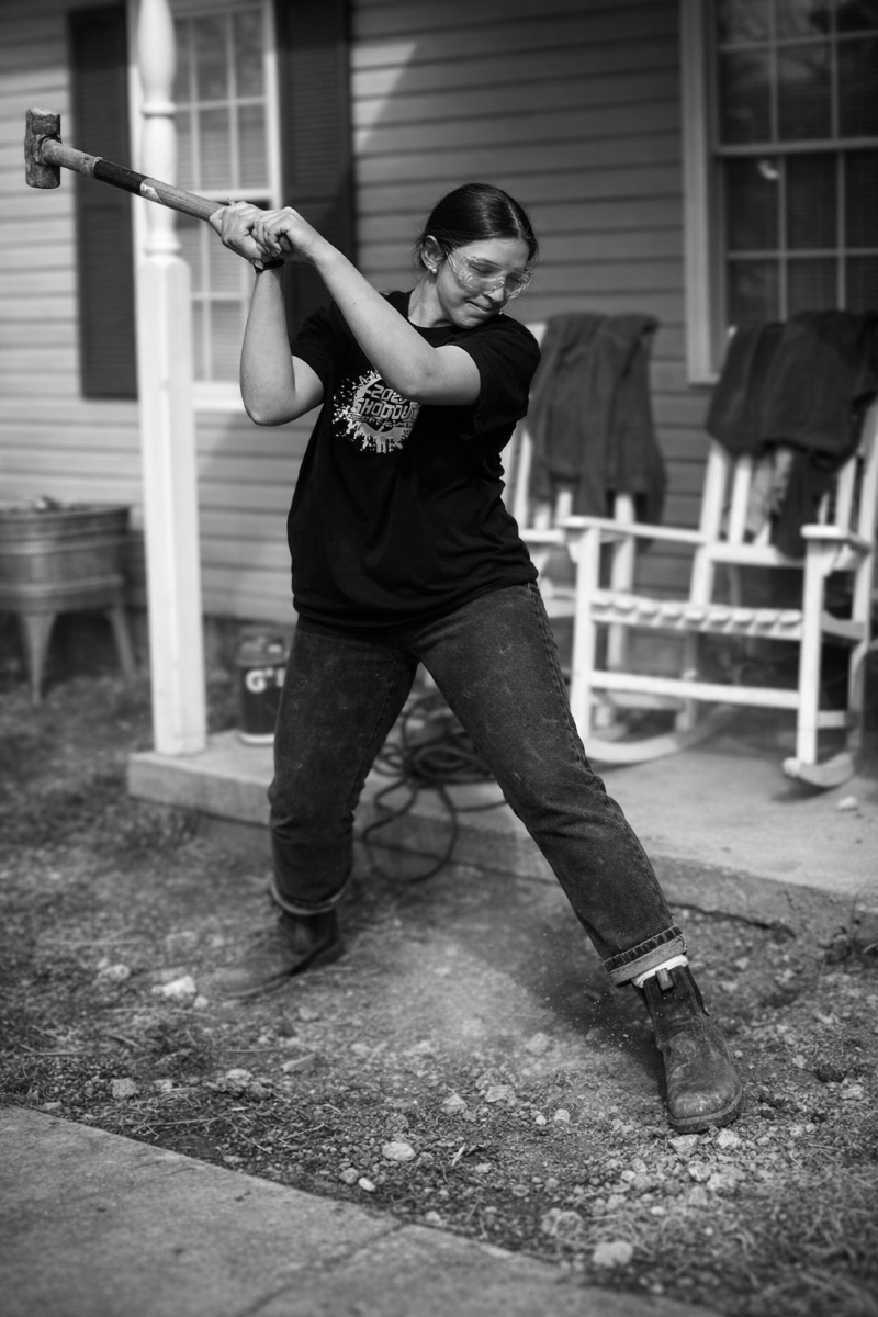 girl breaking cement
