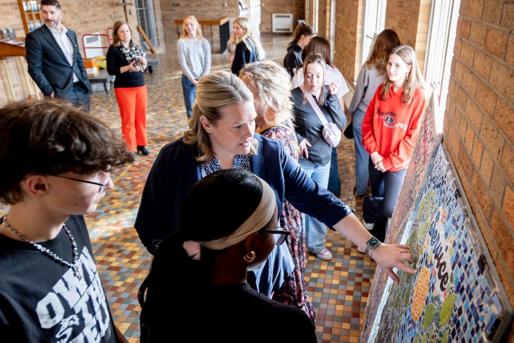 group looking at art