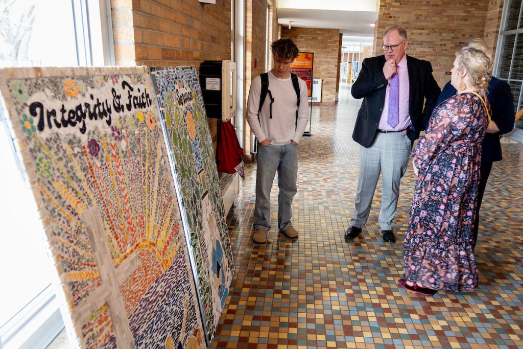 Group looking at art