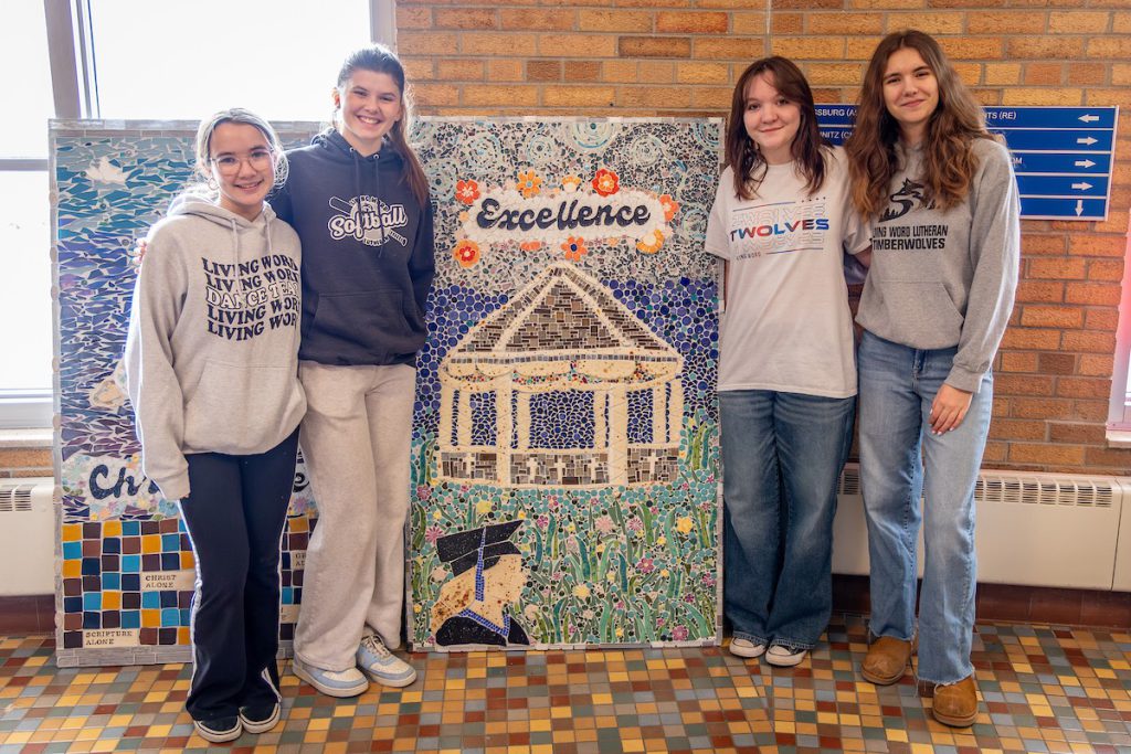 Students standing by art