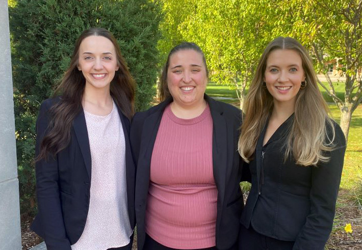 three woman standing together