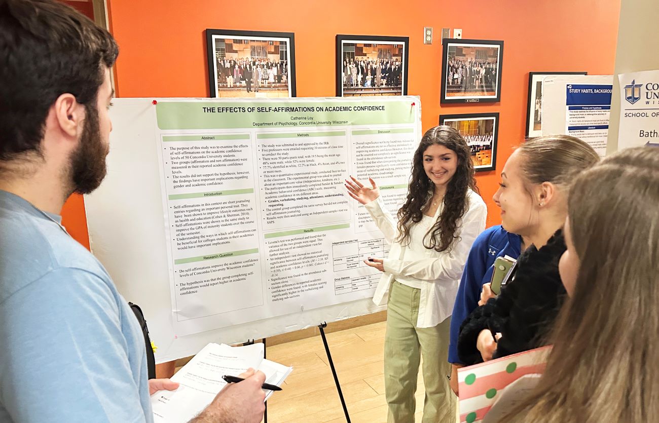 students presenting posters