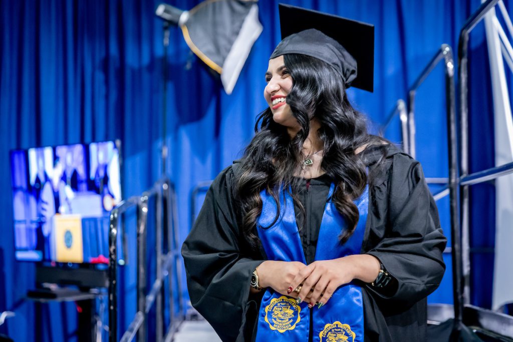 sideview of girl in cap and gown