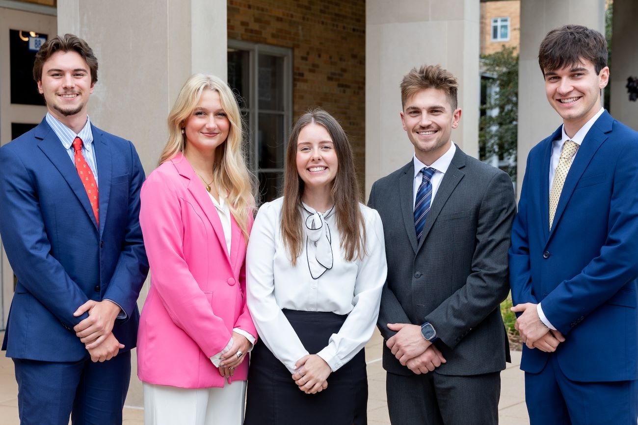 five students dressed up