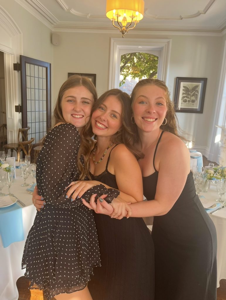three girls hugging