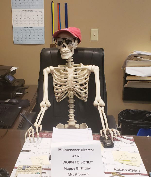 skeleton in desk chair