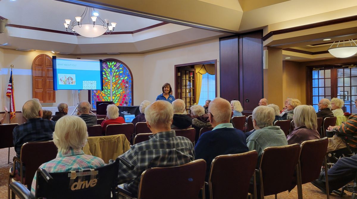people in seats for presentation
