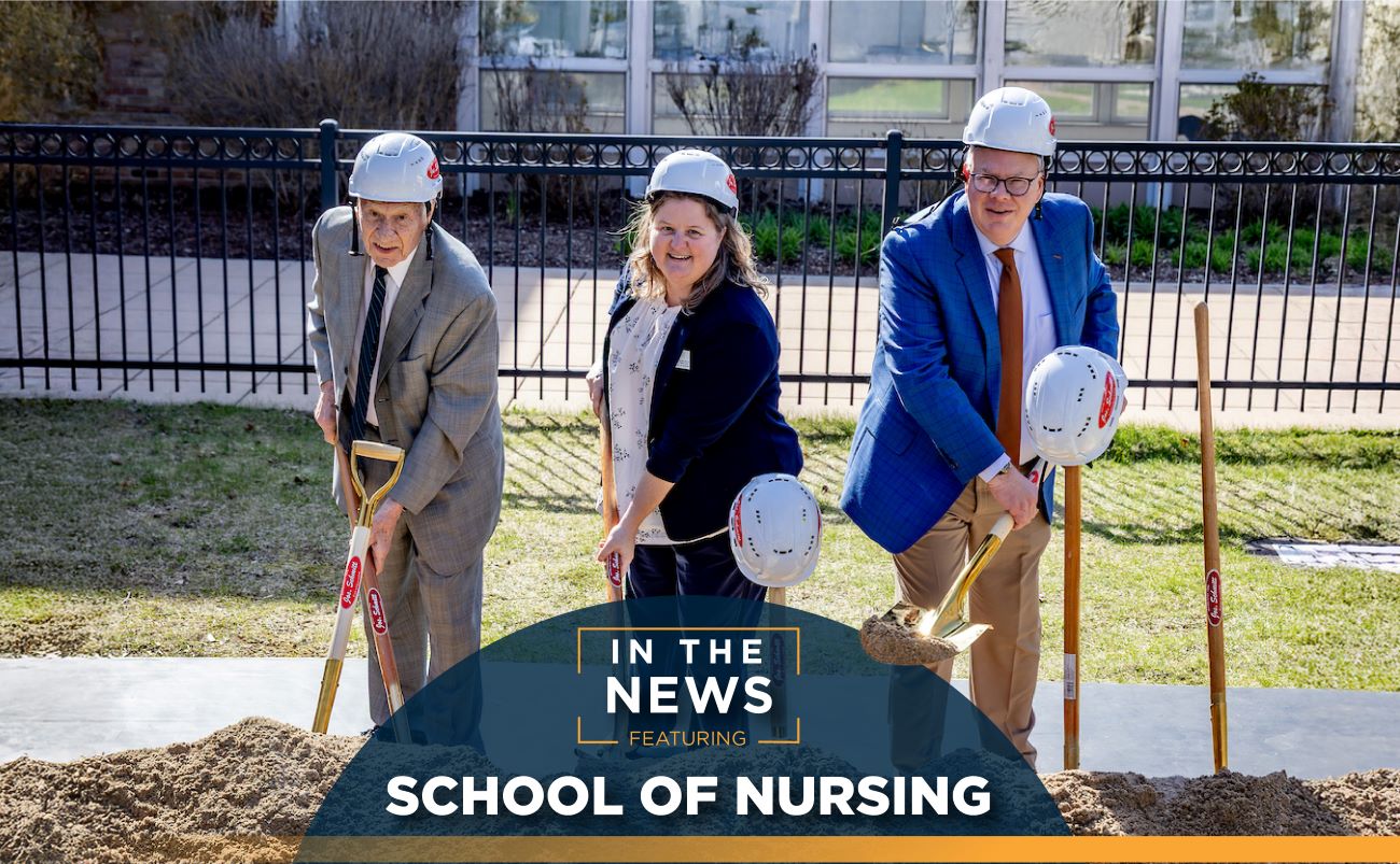 Dr. Ankerberg, Dean Leiberg and one more person taking a shovel full of dirt