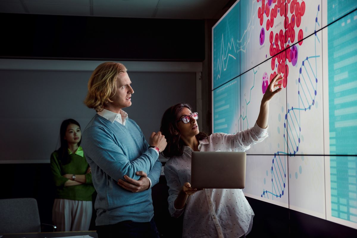 woman and man looking at chart