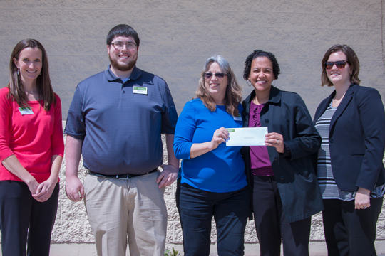 Debbie Elliott, general merchandise manager at Shopko, Grafton, presents a check from the Shopko Foundation to Dr. Reivian Berrios, assistant professor in Occupational Therapy (OT) department at CUW.