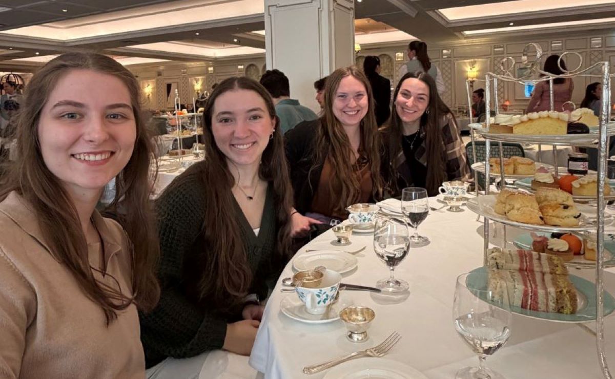 four girls having tea